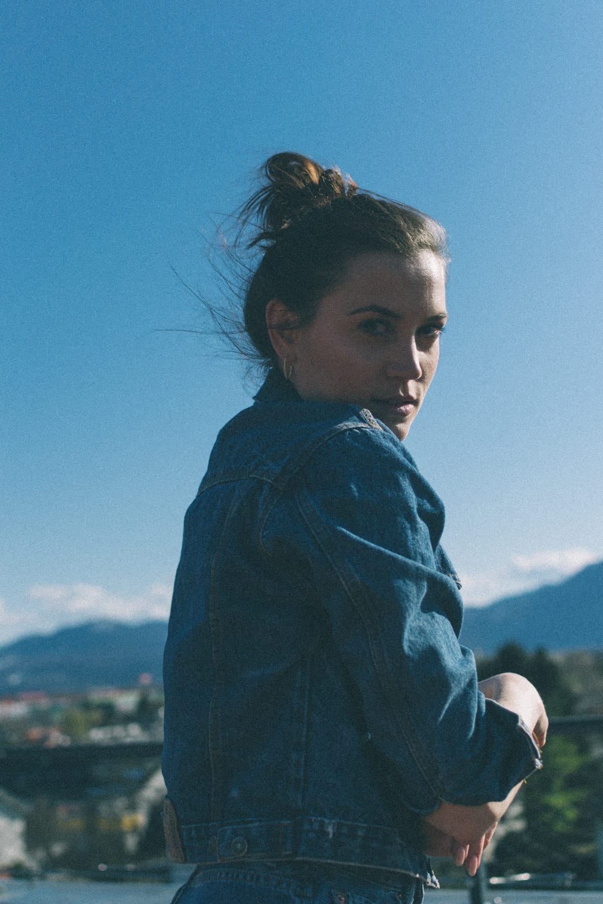 Moody outdoor portrait capturing emotional depth